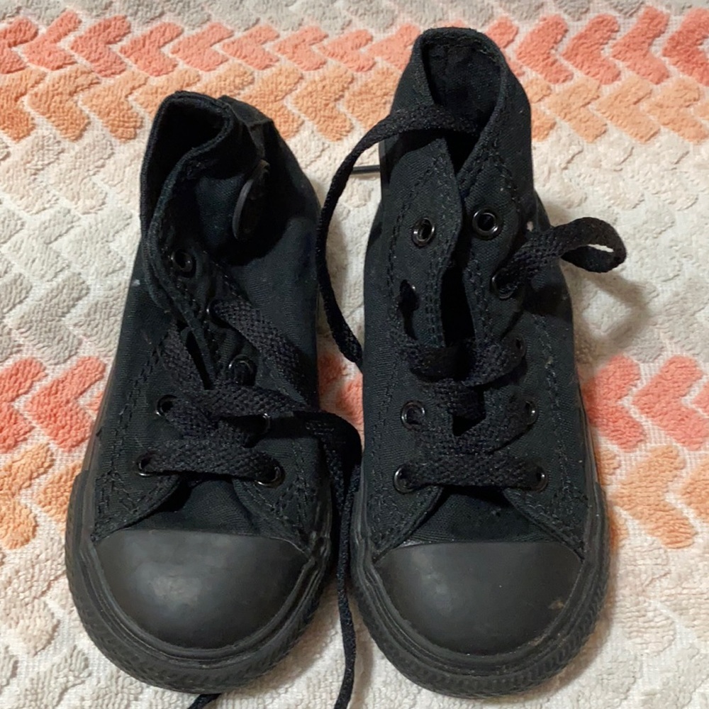 Black high top converse shoes